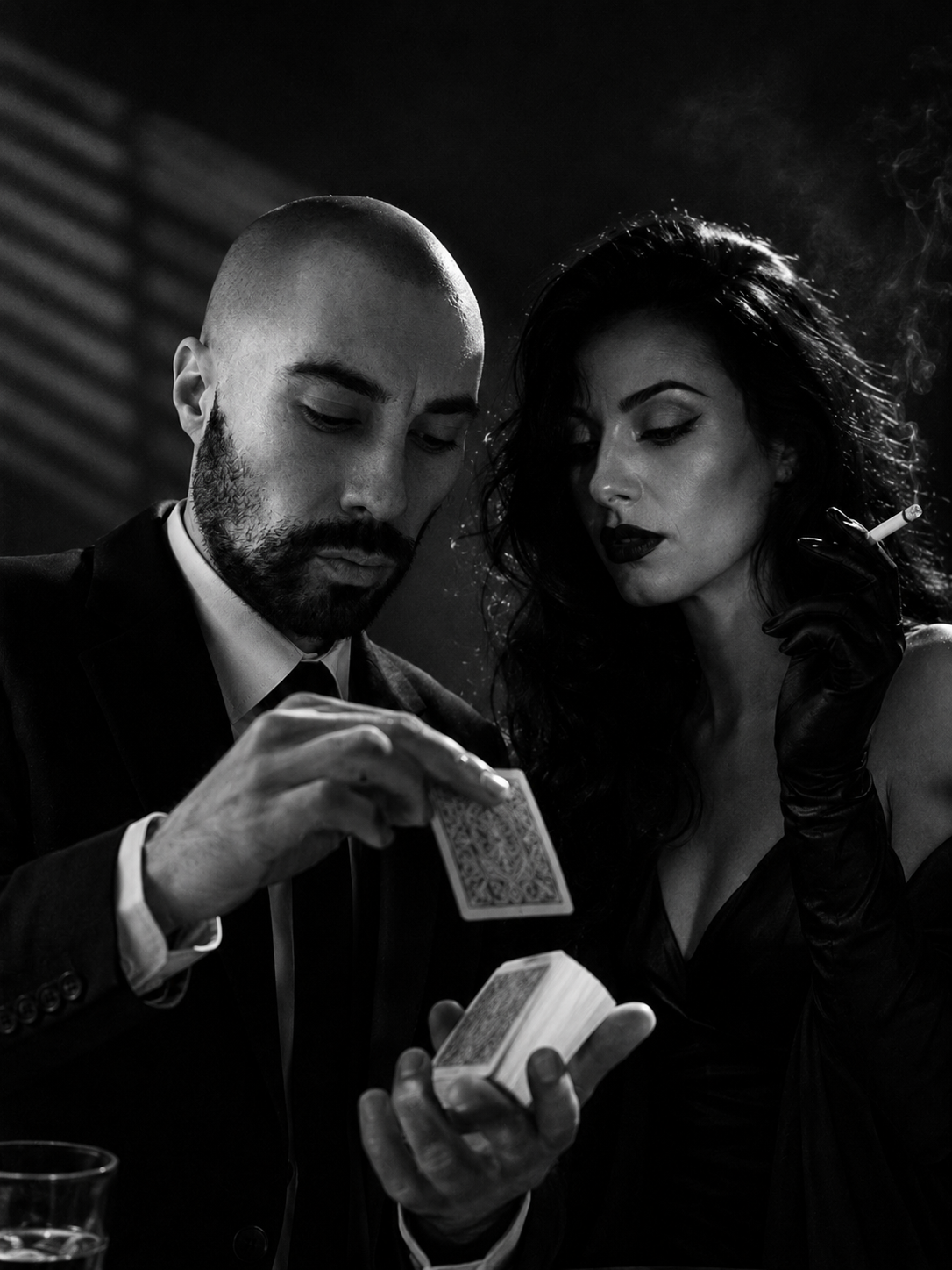 Lex Lunor performing a card study beside a poised observer